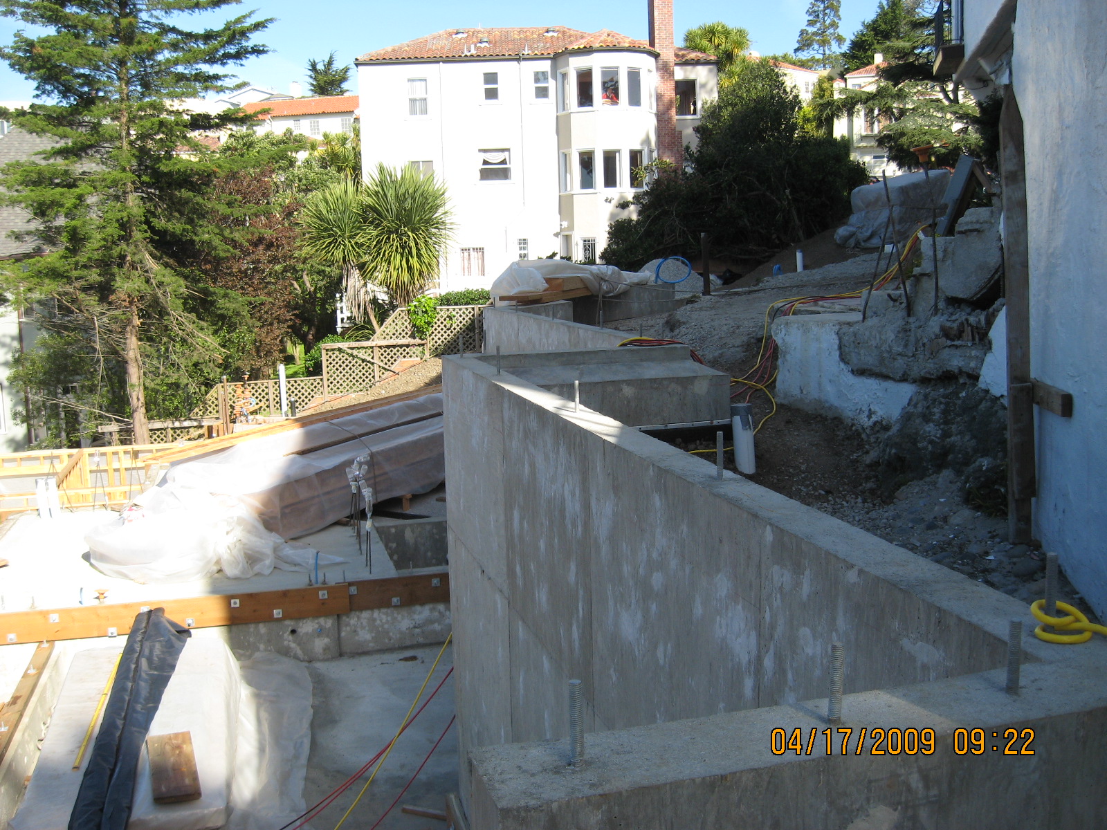Drilling piers for retaining wall