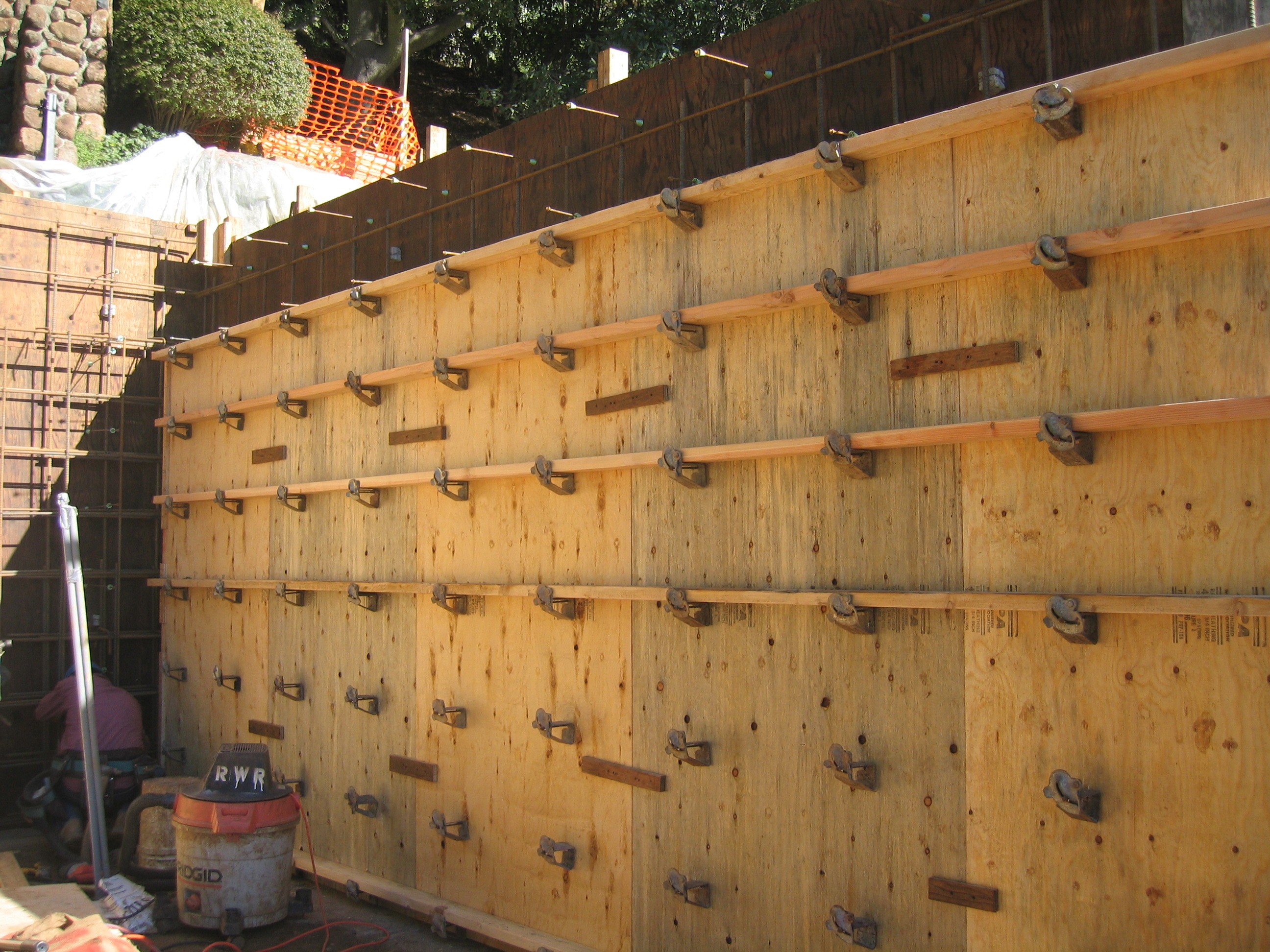 Installing pressure-treated wood lagging