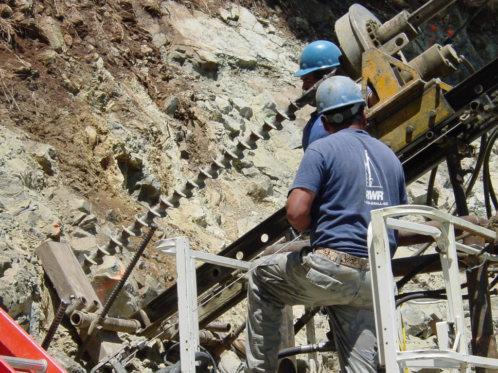 Drilling small diameter hole in rock