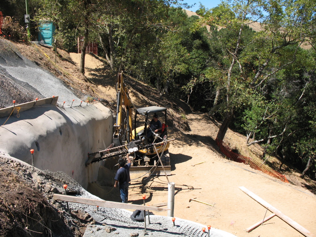 Tieback installation in shotcrete wall