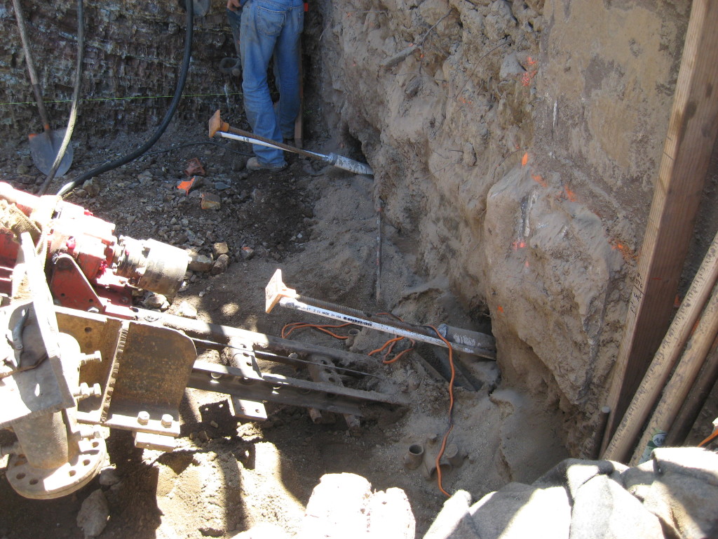 Installed tiebacks in hillside
